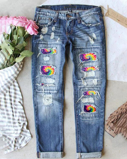 TIE DYE RIPPED JEANS